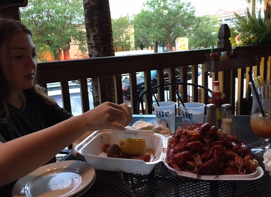 Now it’s Talia at the Blind Pelican in NOLA eating crawfish for the first time.